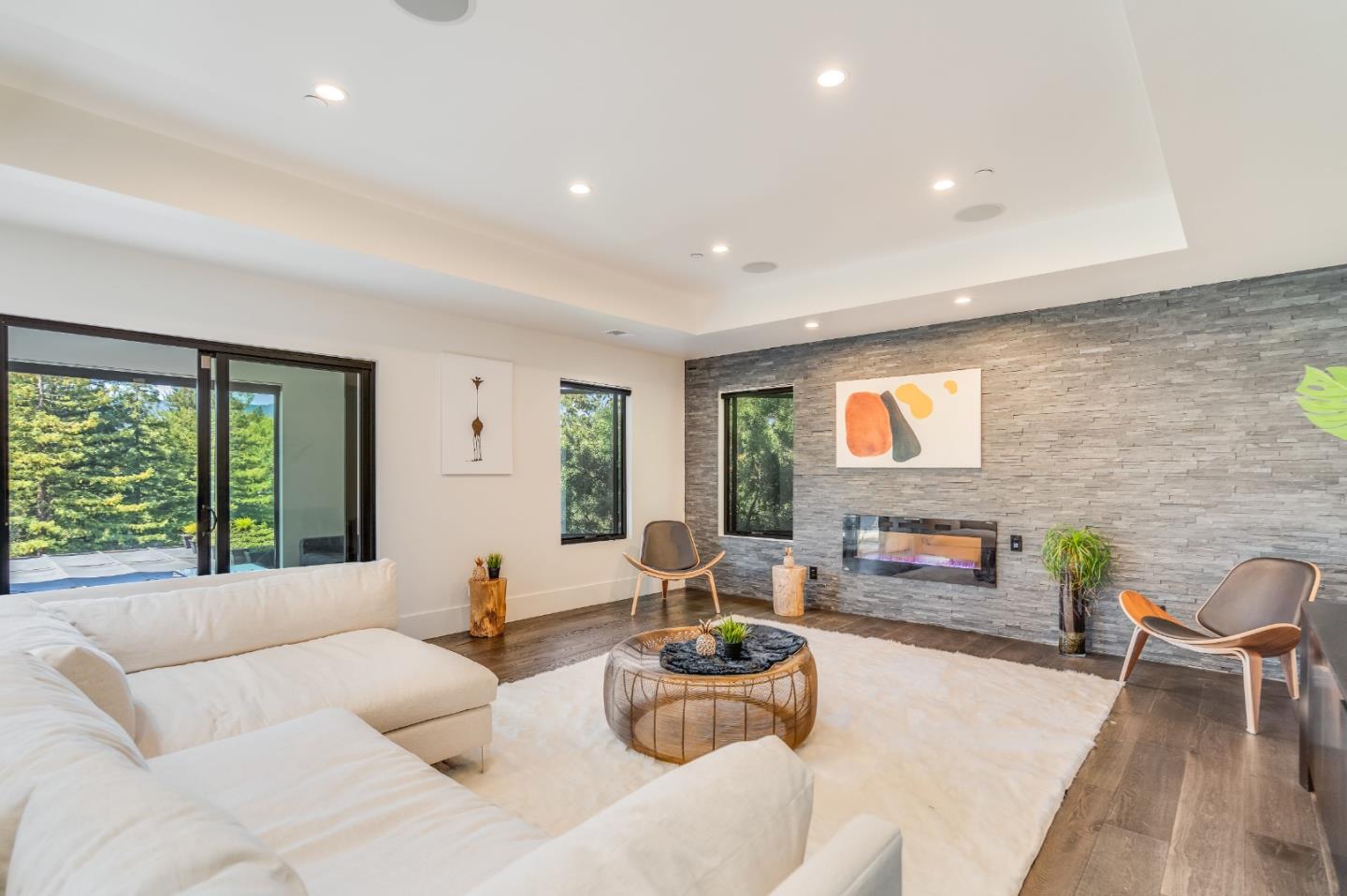 1115 Trinity Drive Menlo Park, CA 94025 - Photo 20 of 50 a living room with furniture fireplace and a large window