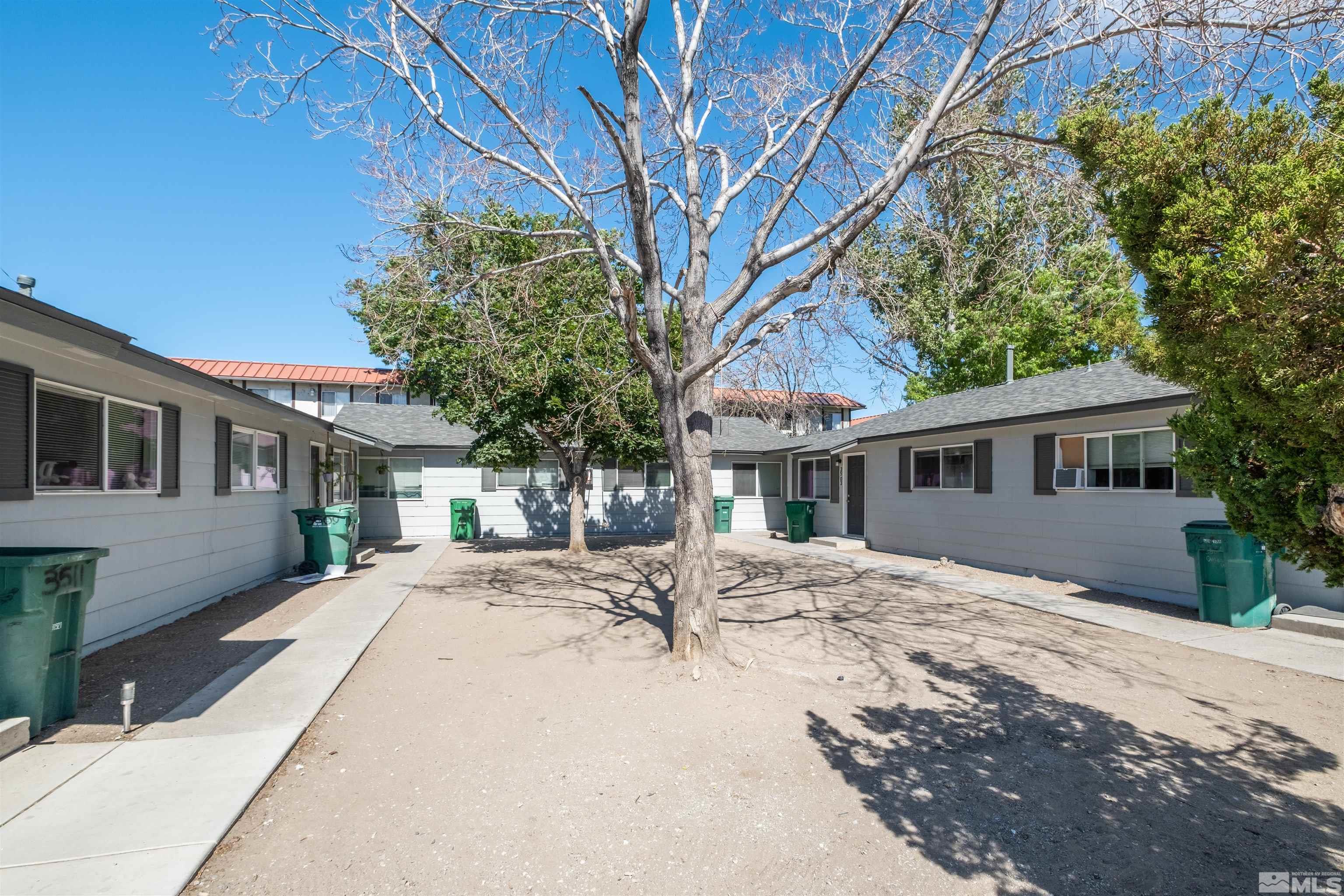 3501 Carlos Lane Reno, NV 89502 - Photo 1 of 7 a front view of a house with a yard
