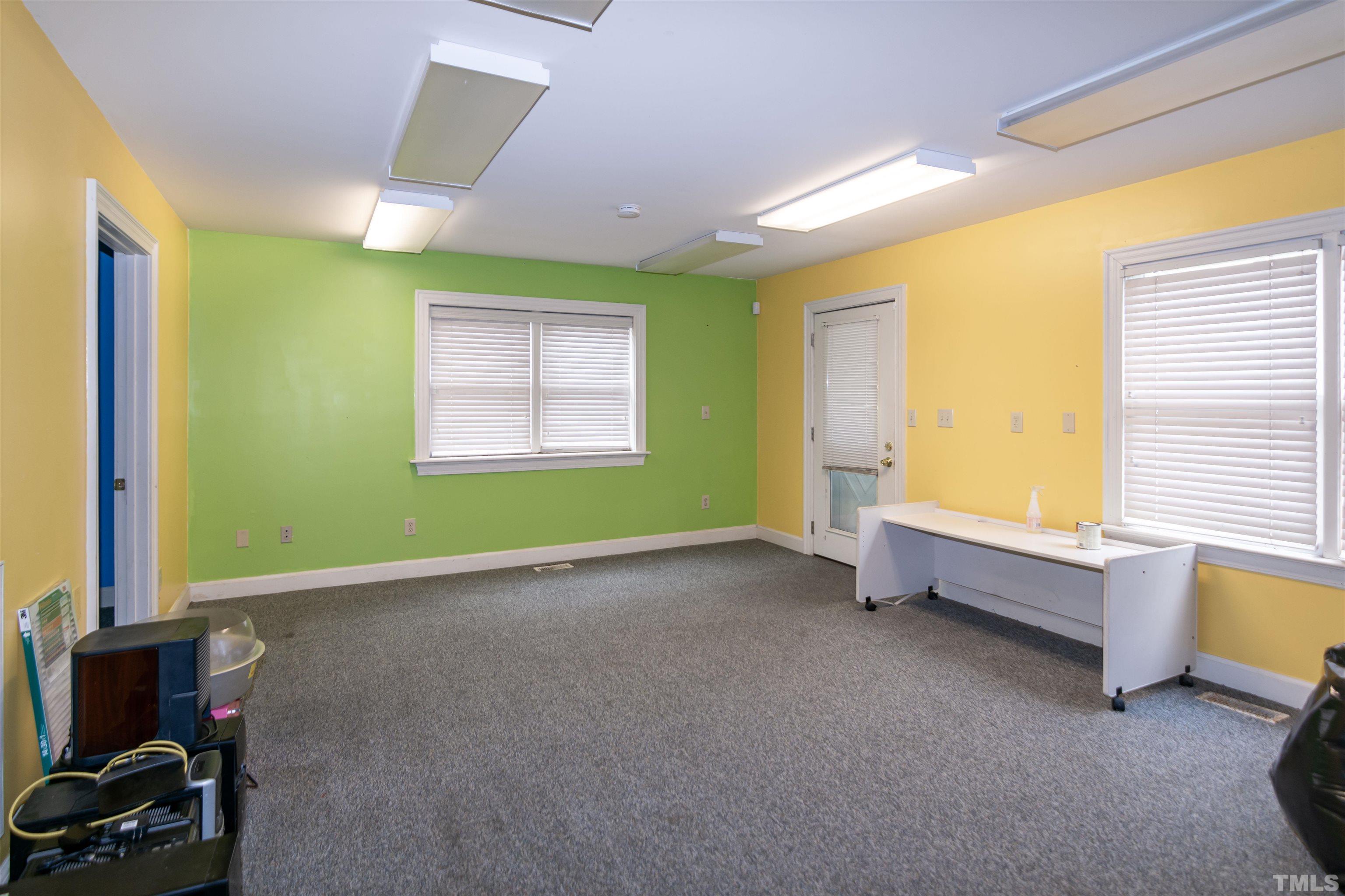 7020 Zebulon Road Wake Forest, NC 27587 - Photo 24 of 45 a view of an empty room with a window