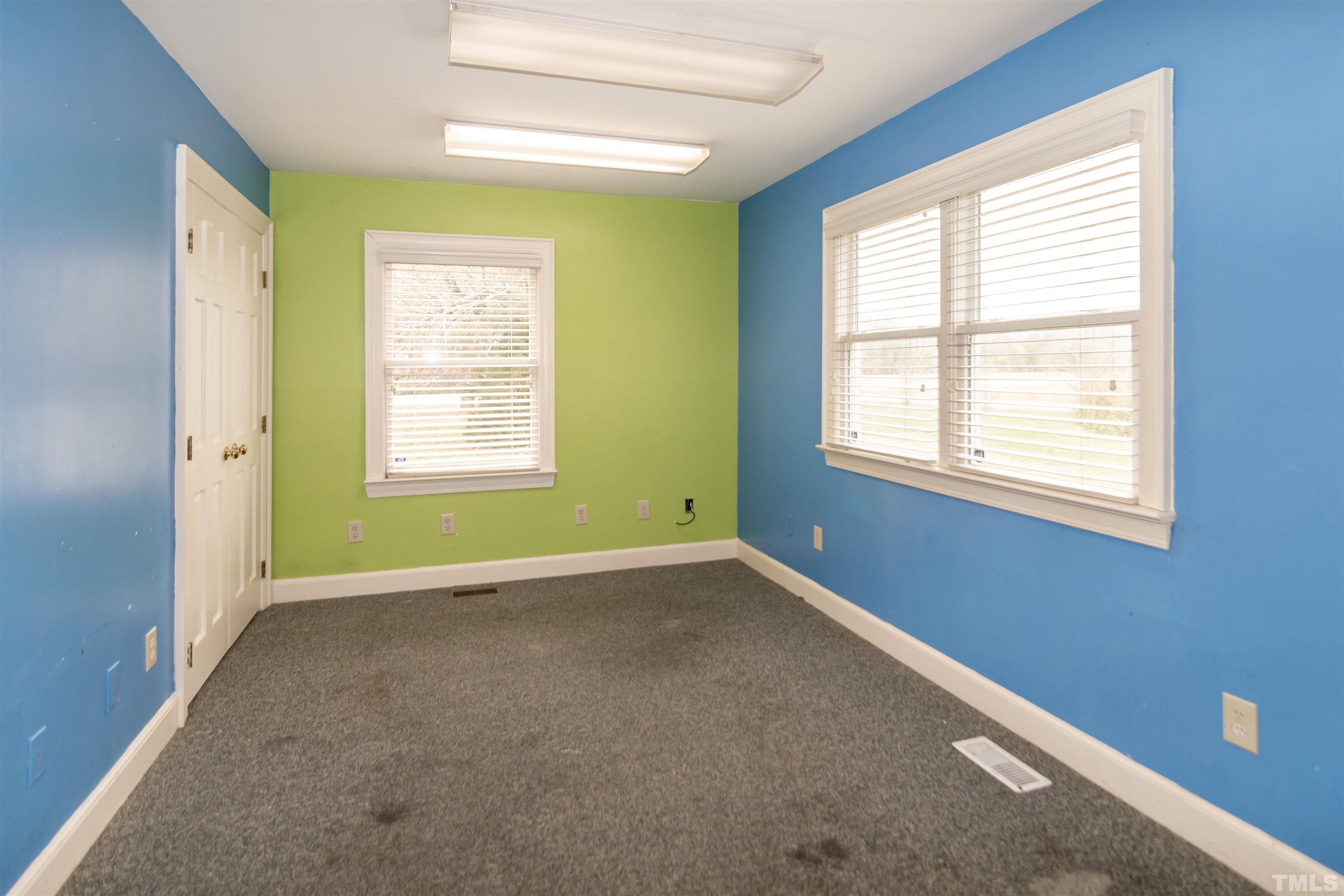 7020 Zebulon Road Wake Forest, NC 27587 - Photo 26 of 45 a view of an empty room with a window