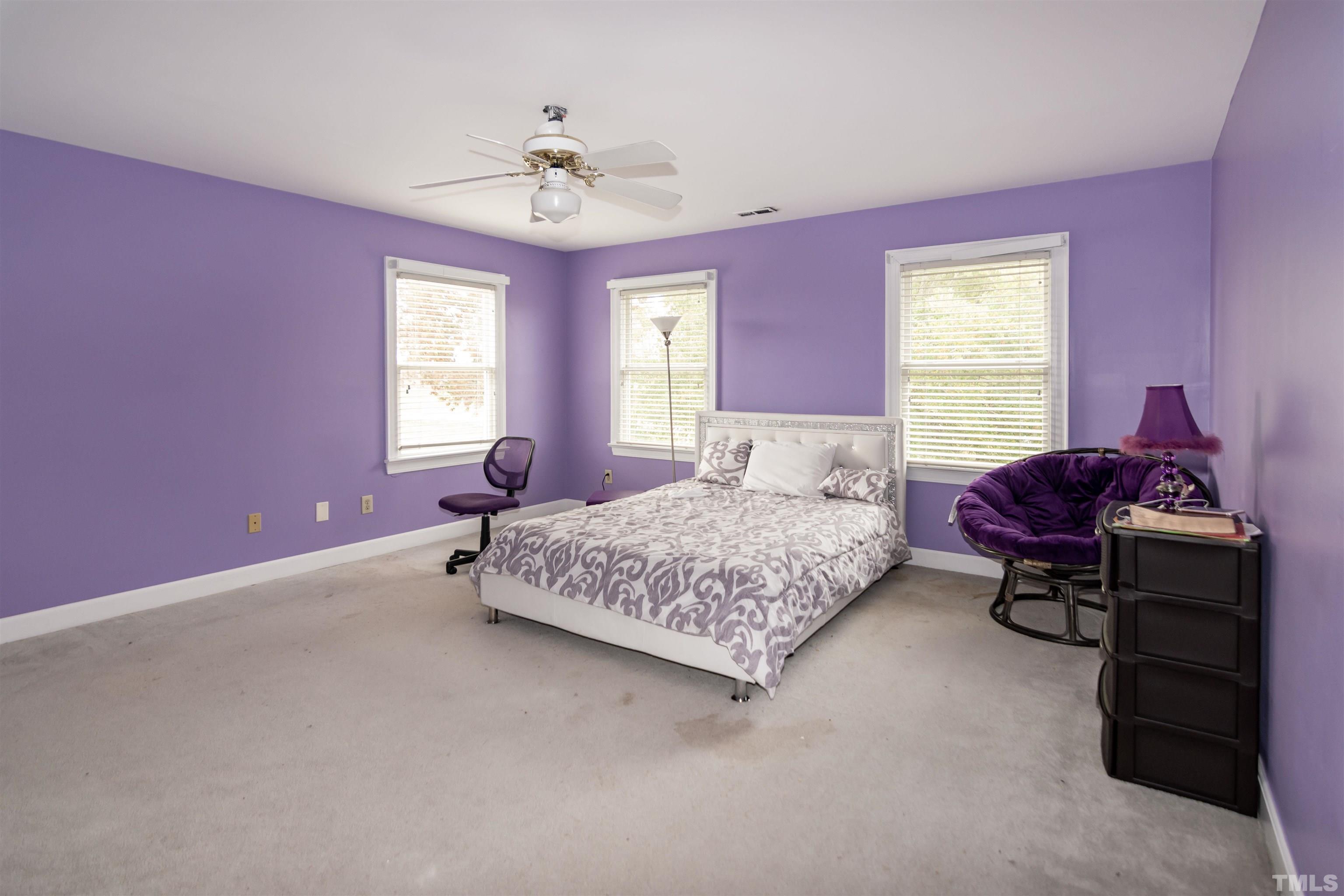 7020 Zebulon Road Wake Forest, NC 27587 - Photo 30 of 45 a bedroom with a bed and window