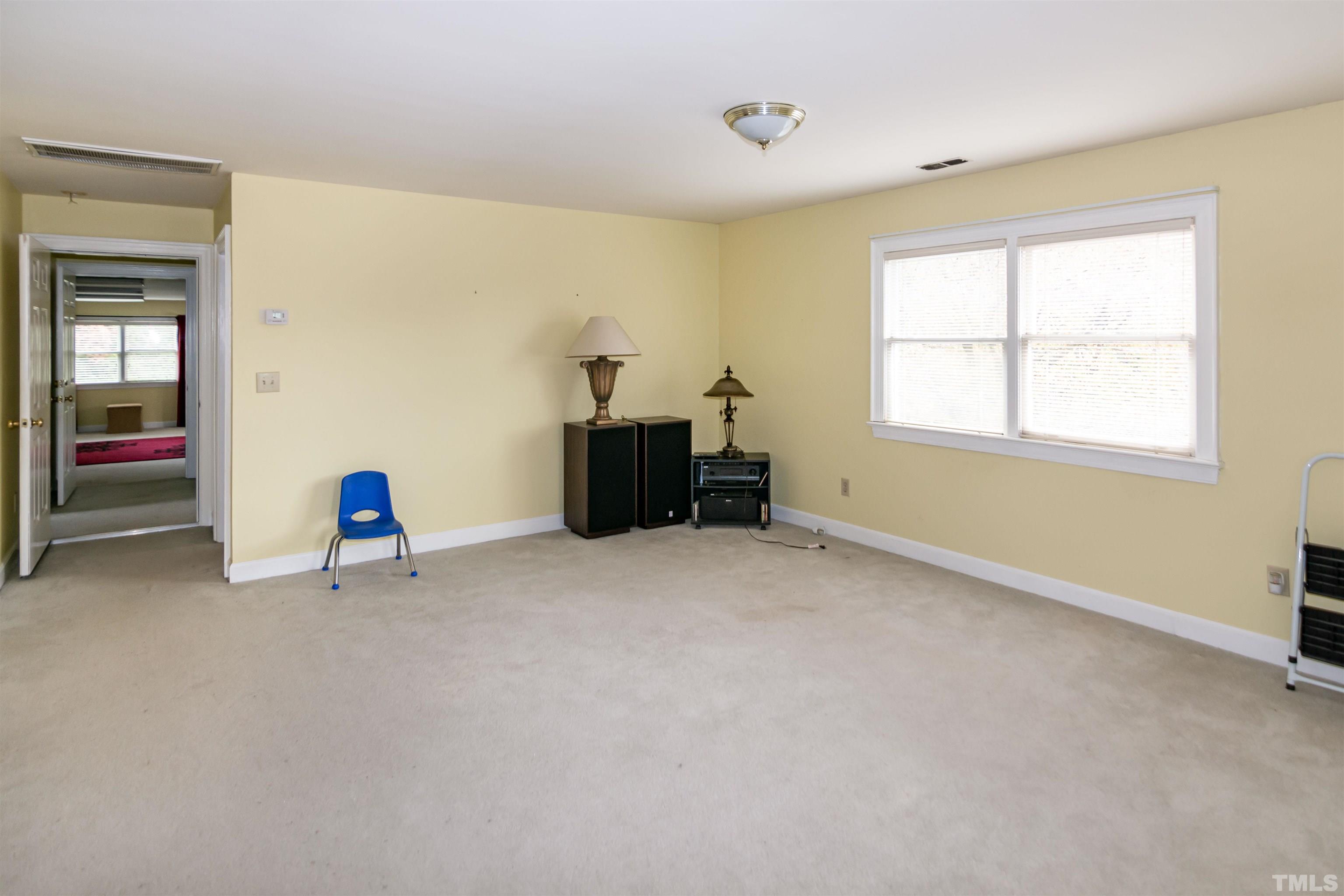 7020 Zebulon Road Wake Forest, NC 27587 - Photo 35 of 45 a living room with furniture and a window