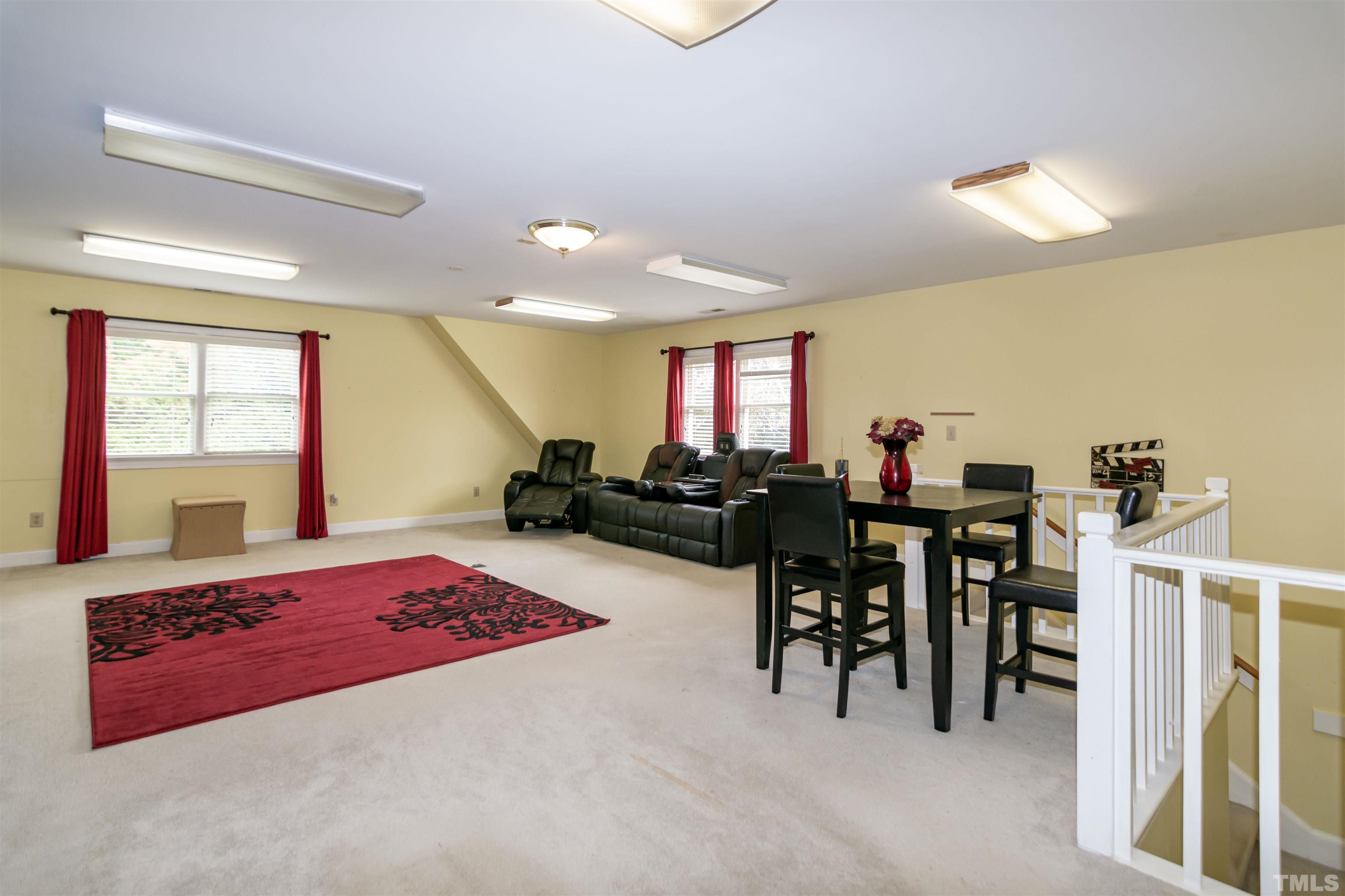 7020 Zebulon Road Wake Forest, NC 27587 - Photo 39 of 45 a living room with furniture and a large window