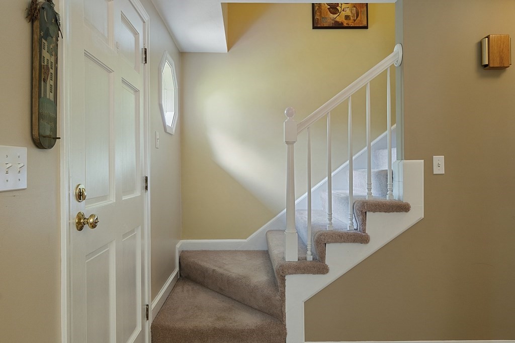 2 Groton Road Tyngsborough, MA 01879 - Photo 13 of 39 a view of entryway and hall with wooden floor