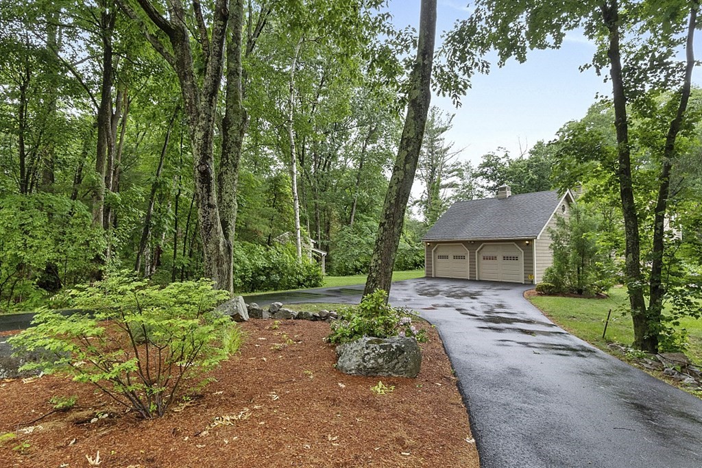 2 Groton Road Tyngsborough, MA 01879 - Photo 3 of 39 a pathway of a house with a yard