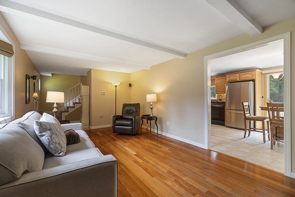 2 Groton Road Tyngsborough, MA 01879 - Photo 9 of 39 a living room with furniture and wooden floor