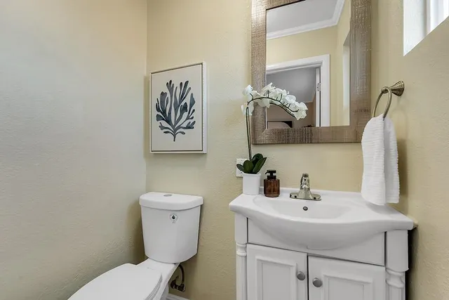 a bathroom with a sink a toilet and bathtub