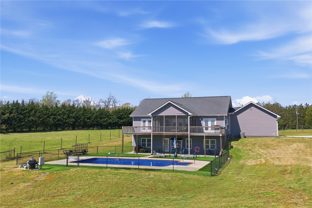 426 Oak Creek Road Seneca, SC 29678 - Photo 36 of 50 This two-story residence features a private pool and spacious outdoor living areas, perfect for leisure.