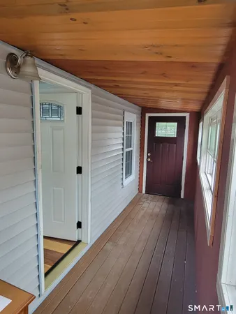 a view of wooden floor in an empty room