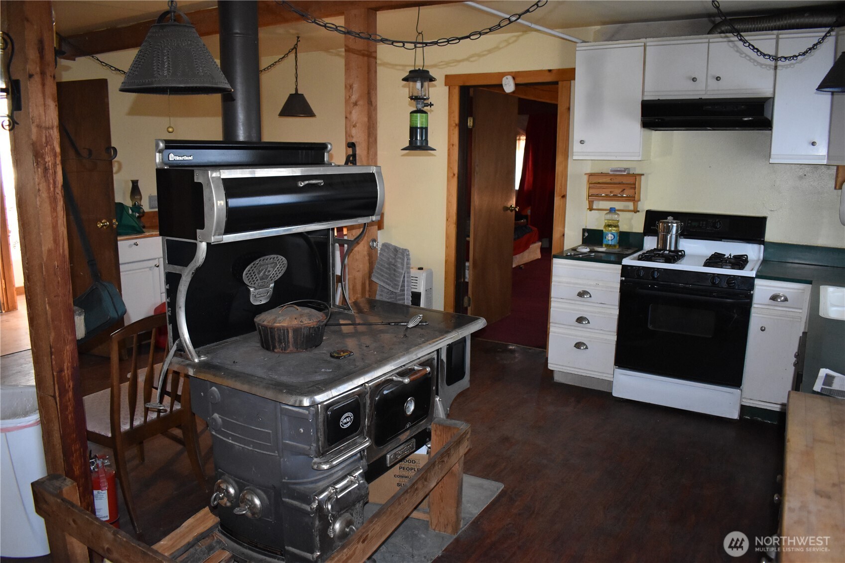 0 Sleepy Hollow Road Curlew, WA 99118 - Photo 28 of 39 a kitchen with stainless steel appliances granite countertop a stove and a refrigerator