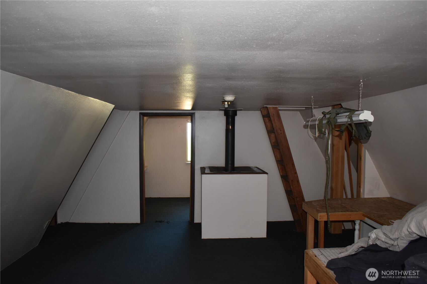 0 Sleepy Hollow Road Curlew, WA 99118 - Photo 31 of 39 a view of walk in closet with clothes and shoes