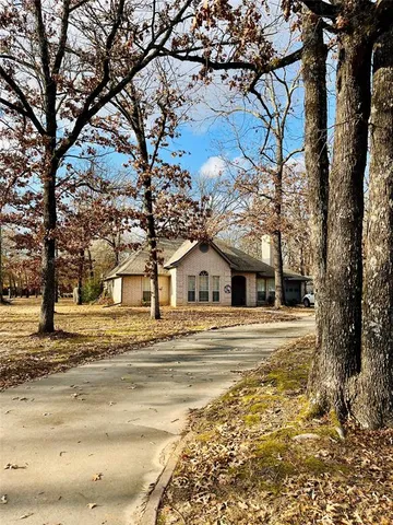 $325,000 | 455 Timber Lakes Drive, Powderly, TX 75473