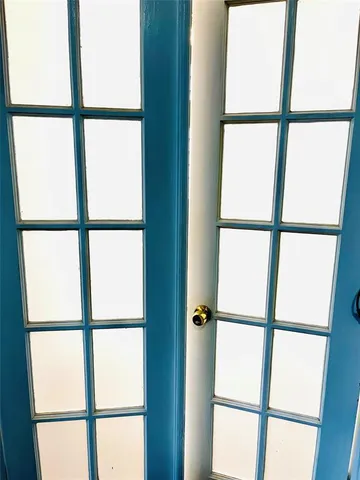 a spacious bathroom with a tub sink and mirror