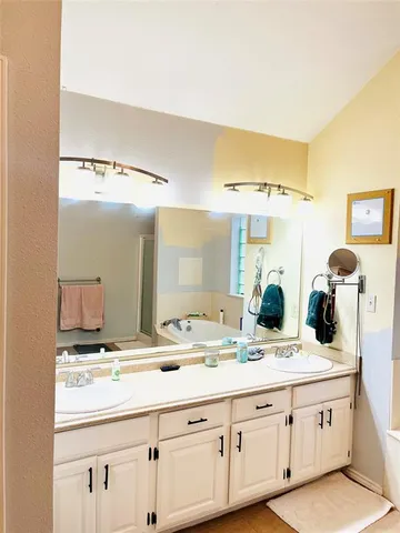 a view of walk in closet with window