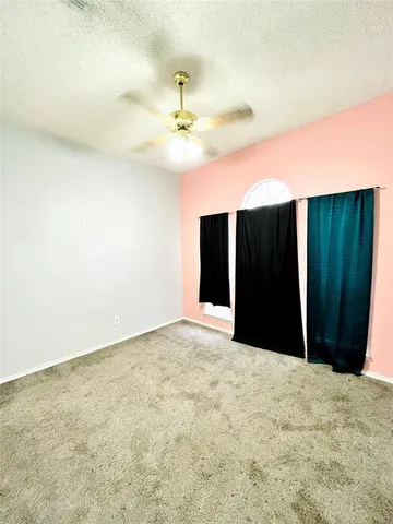 a view of a projector room with a wooden floor