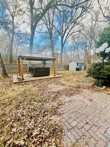 a view of back yard of the house