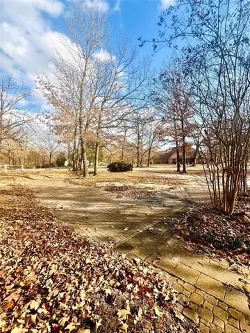 $325,000 | 455 Timber Lakes Drive, Powderly, TX 75473