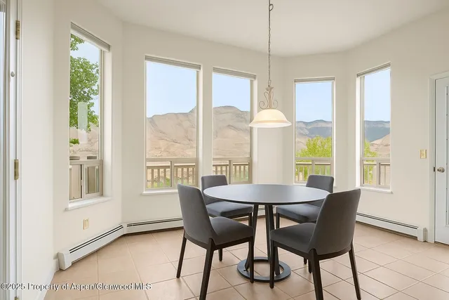 a bedroom with a bed and dresser