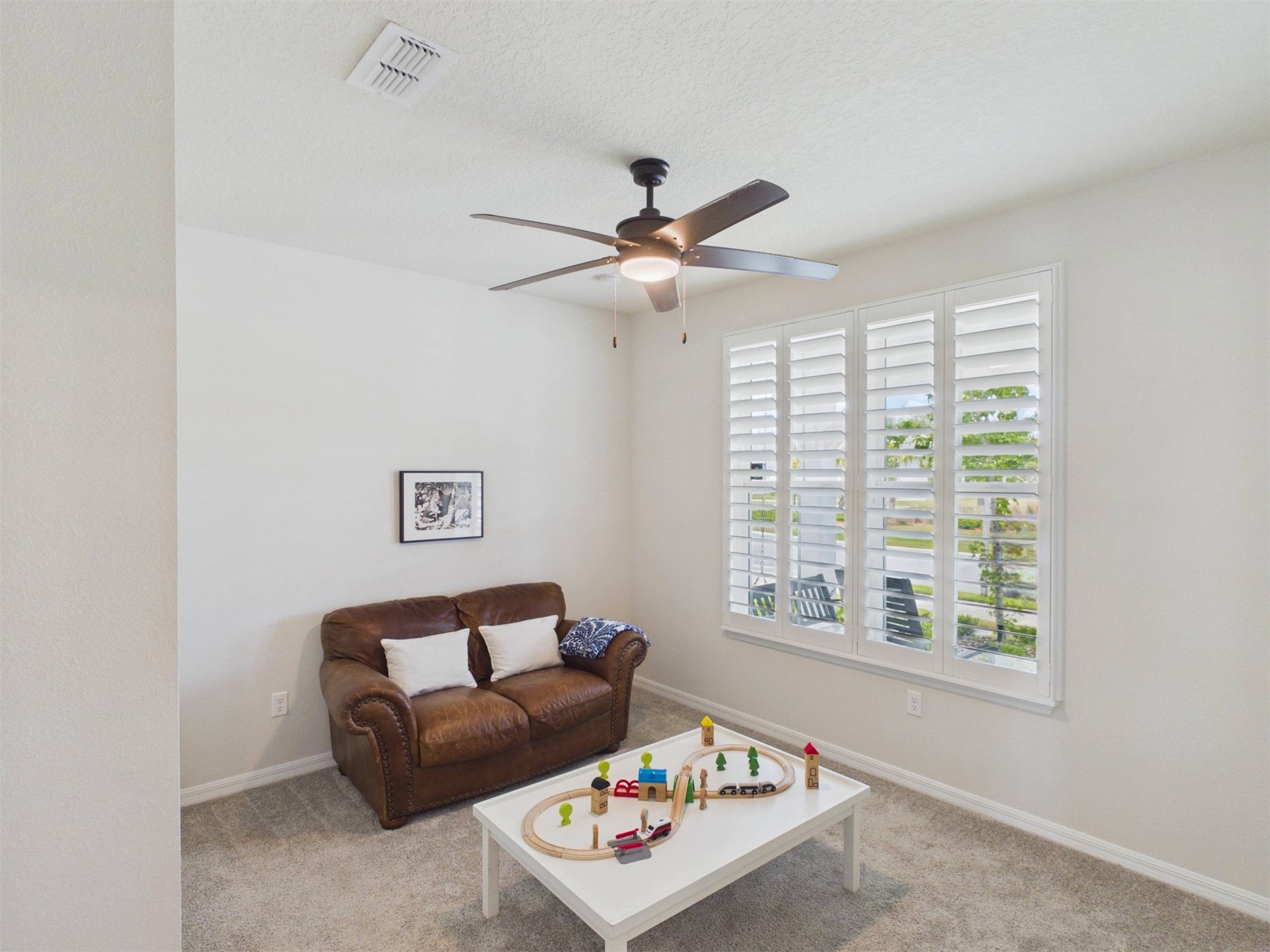 312 Salt Meadow Loop Yulee, FL 32097 - Photo 5 of 22 a living room with furniture and a window