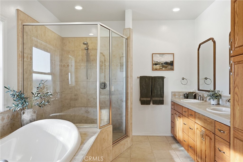 220 Cook Court Templeton, CA 93465 - Photo 20 of 45 a bathroom with a double vanity sink toilet and shower