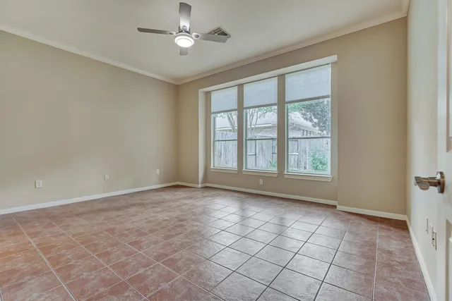 a spacious bathroom with a double vanity sink mirror and bathtub