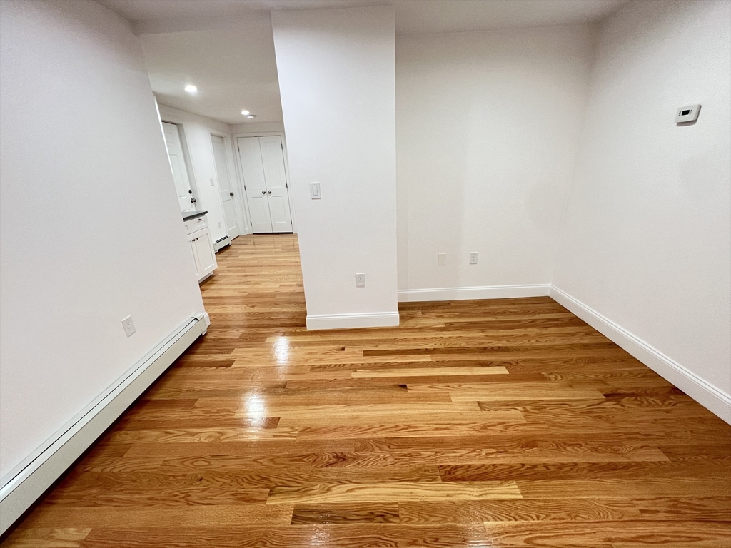 50 Conant Street, Unit 50 Danvers, MA 01923 - Photo 6 of 16 a view of room and wooden floor