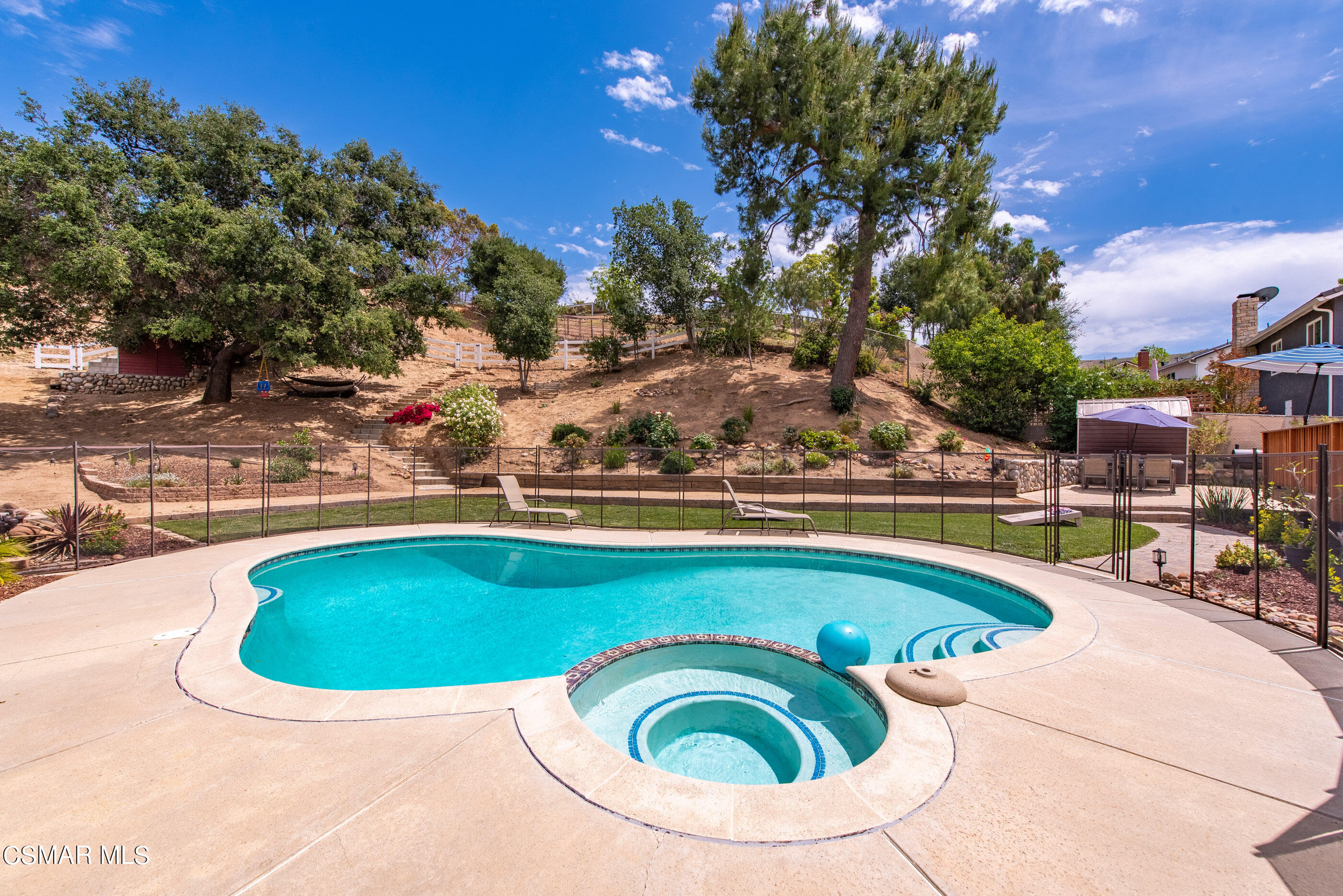 1137 Rambling Road Simi Valley, CA 93065 - Photo 38 of 77 a view of swimming pool with outdoor seating space