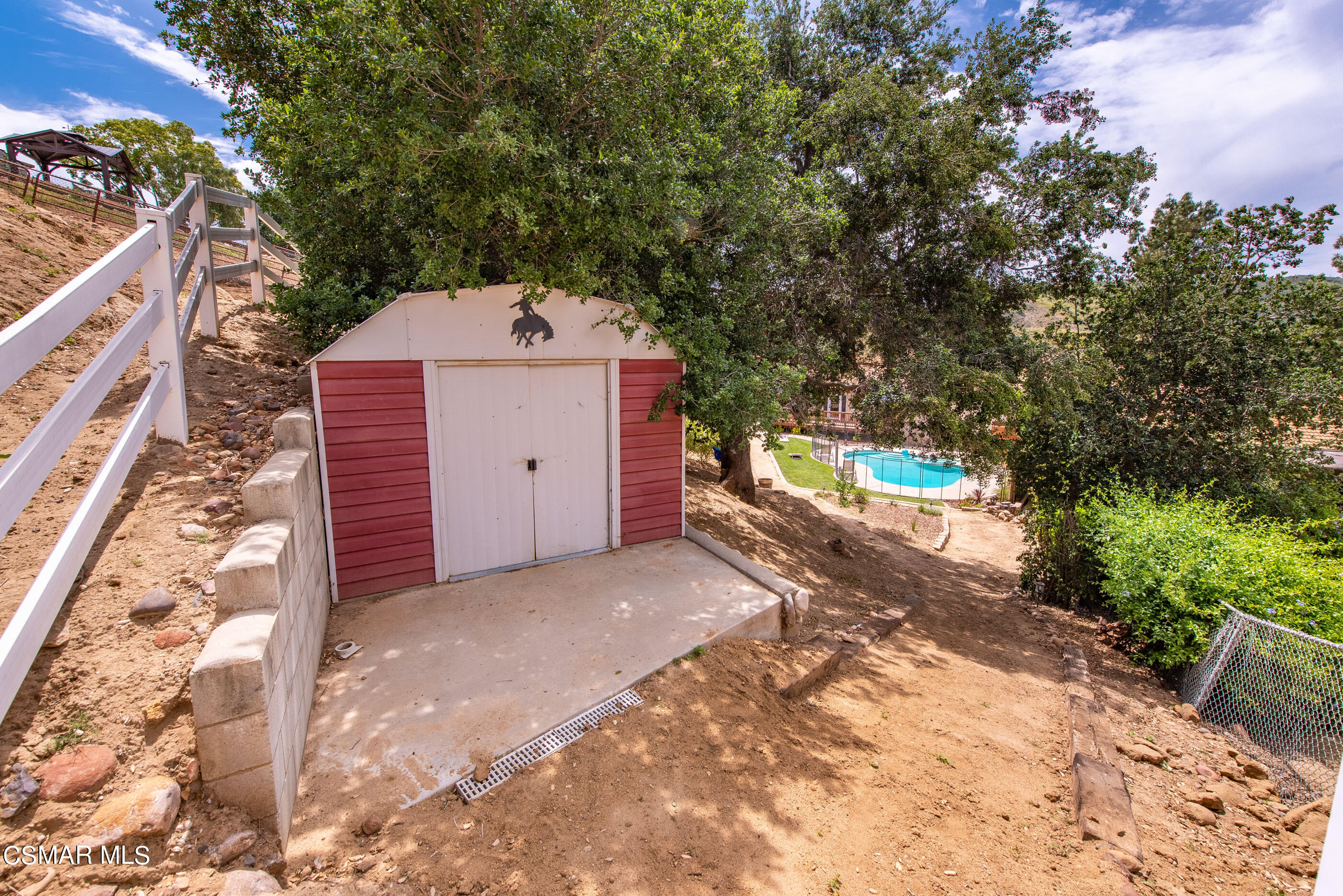 1137 Rambling Road Simi Valley, CA 93065 - Photo 44 of 77 a pathway of a house with a yard