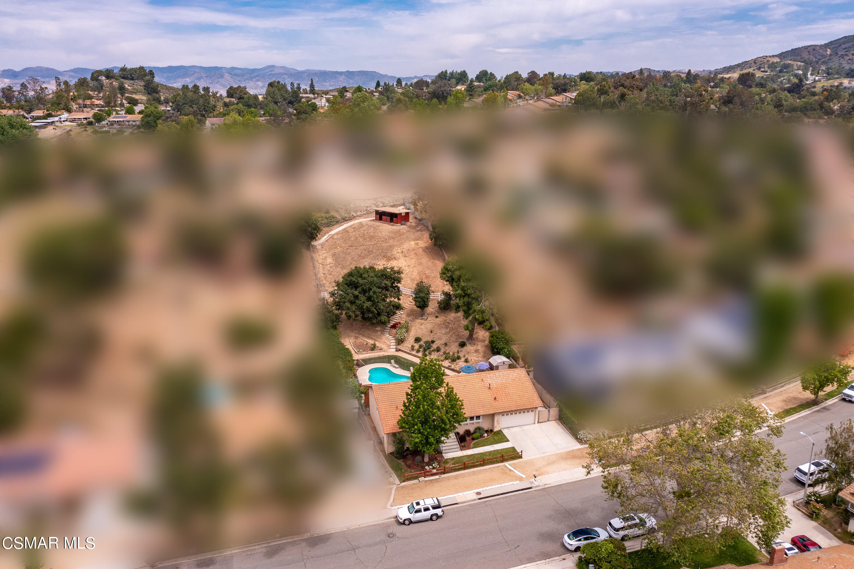 1137 Rambling Road Simi Valley, CA 93065 - Photo 54 of 77 a view of a lake with a mountain in the background