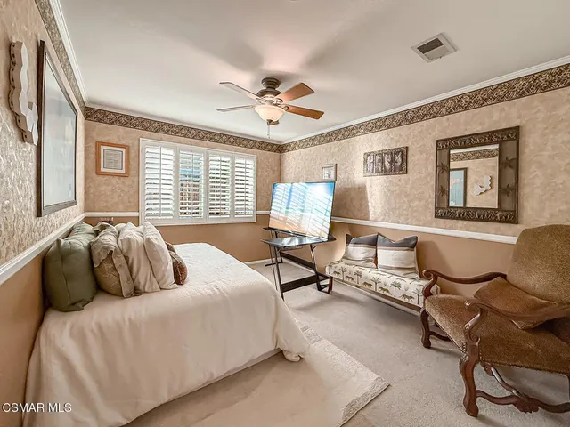 a view of a storage and utility room with a window