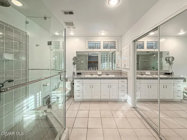 a view of outdoor space with seating area and trees