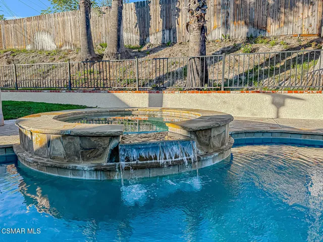 a view of a backyard with a patio