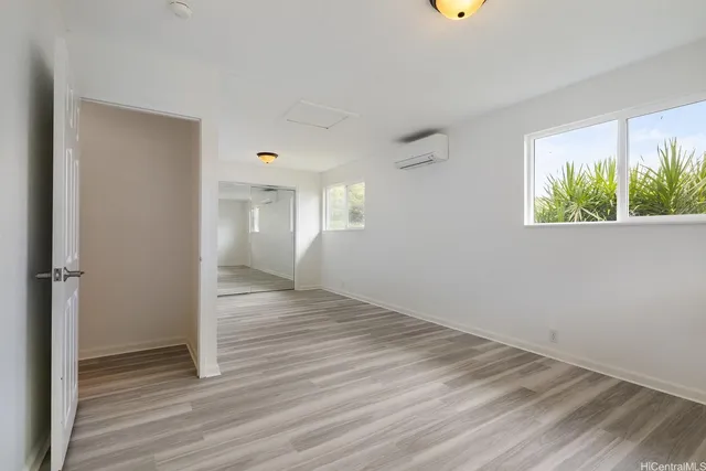 a view of a livingroom with furniture and cabinet