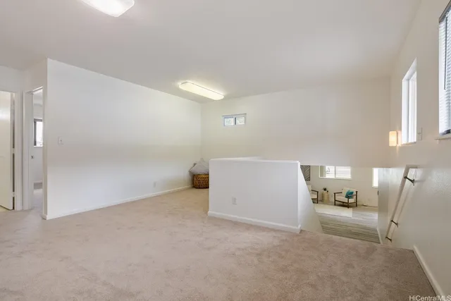 a view of livingroom with furniture and window