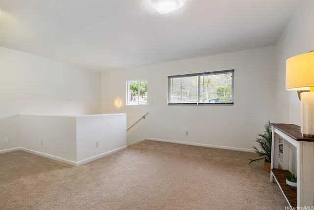 an aerial view of residential houses and outdoor space