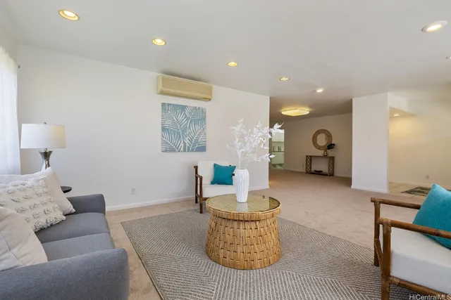 a living room with furniture and a table