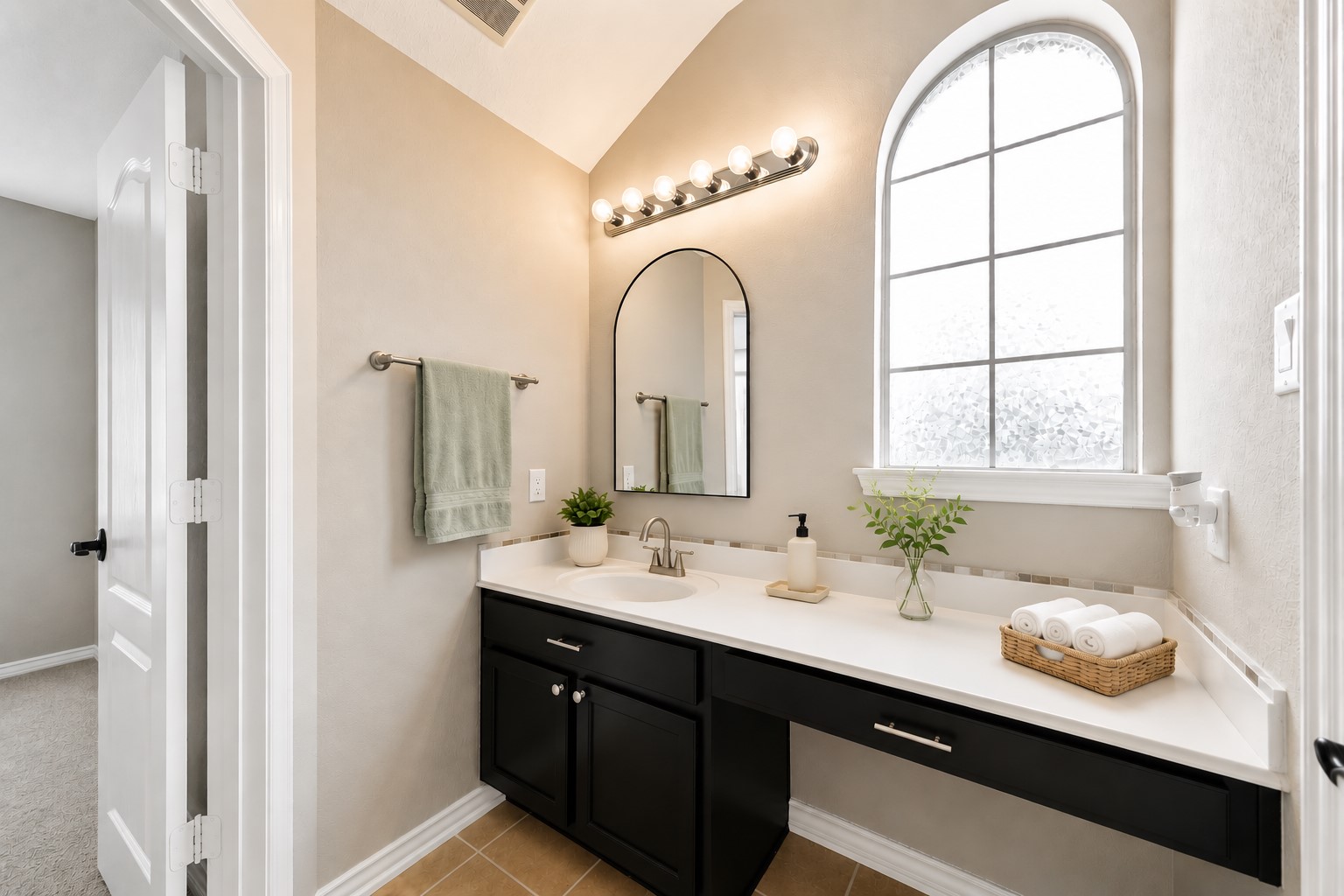 9438 Emerald Lakes Drive Rosharon, TX 77583 - Photo 20 of 36 a en suite bathroom with a granite countertop sink a large mirror and a window