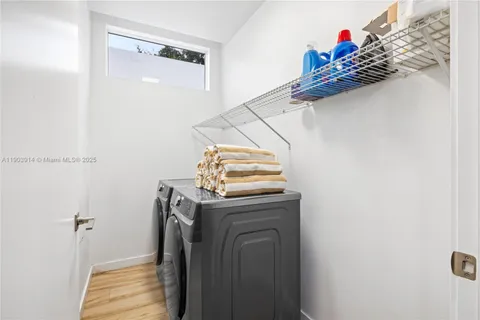 a utility room with dryer and washer