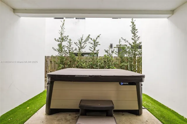 a room with a bed and a window