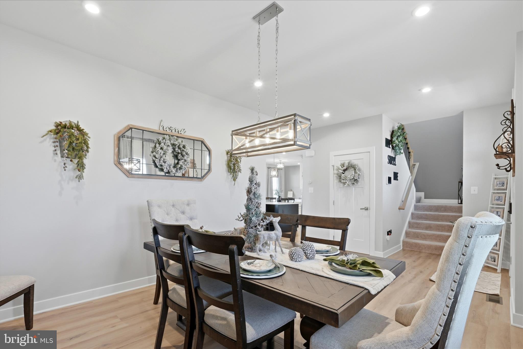 111 Decatur Circle Stephens City, VA 22655 - Photo 11 of 70 a view of a dining room with furniture and wooden floor