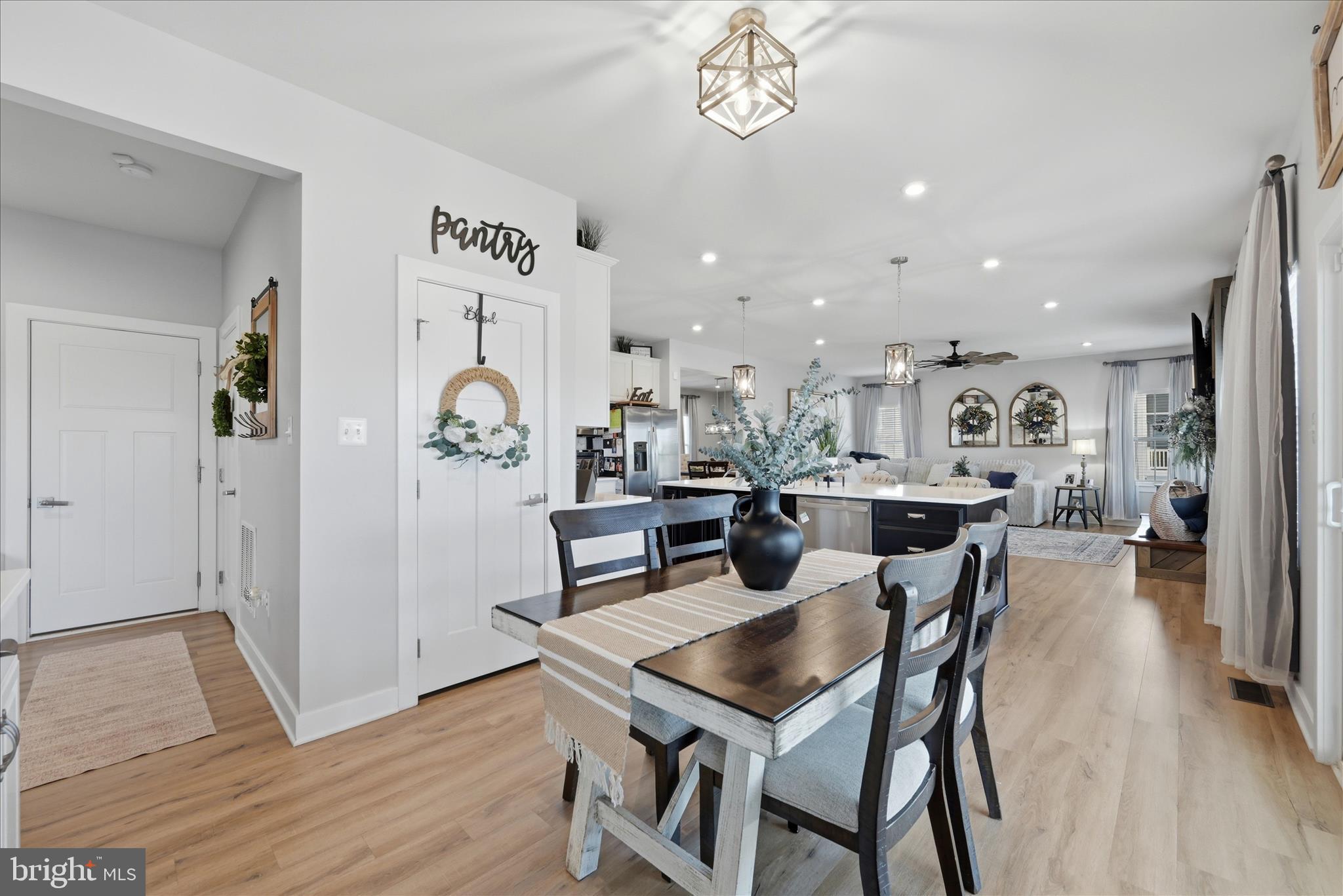 111 Decatur Circle Stephens City, VA 22655 - Photo 21 of 70 a view of a dining room with furniture and wooden floor