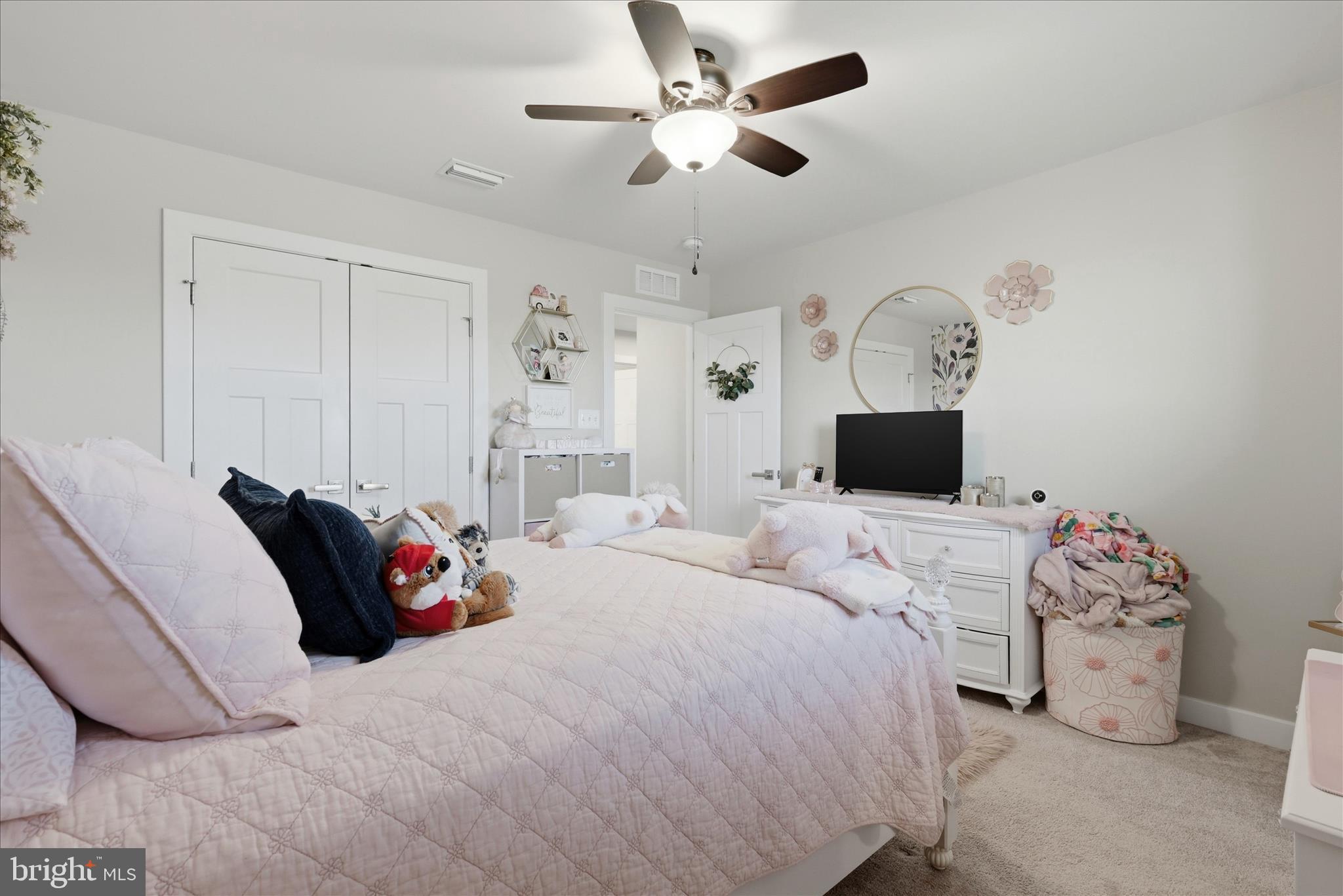 111 Decatur Circle Stephens City, VA 22655 - Photo 38 of 70 a bedroom with a bed and a chandelier