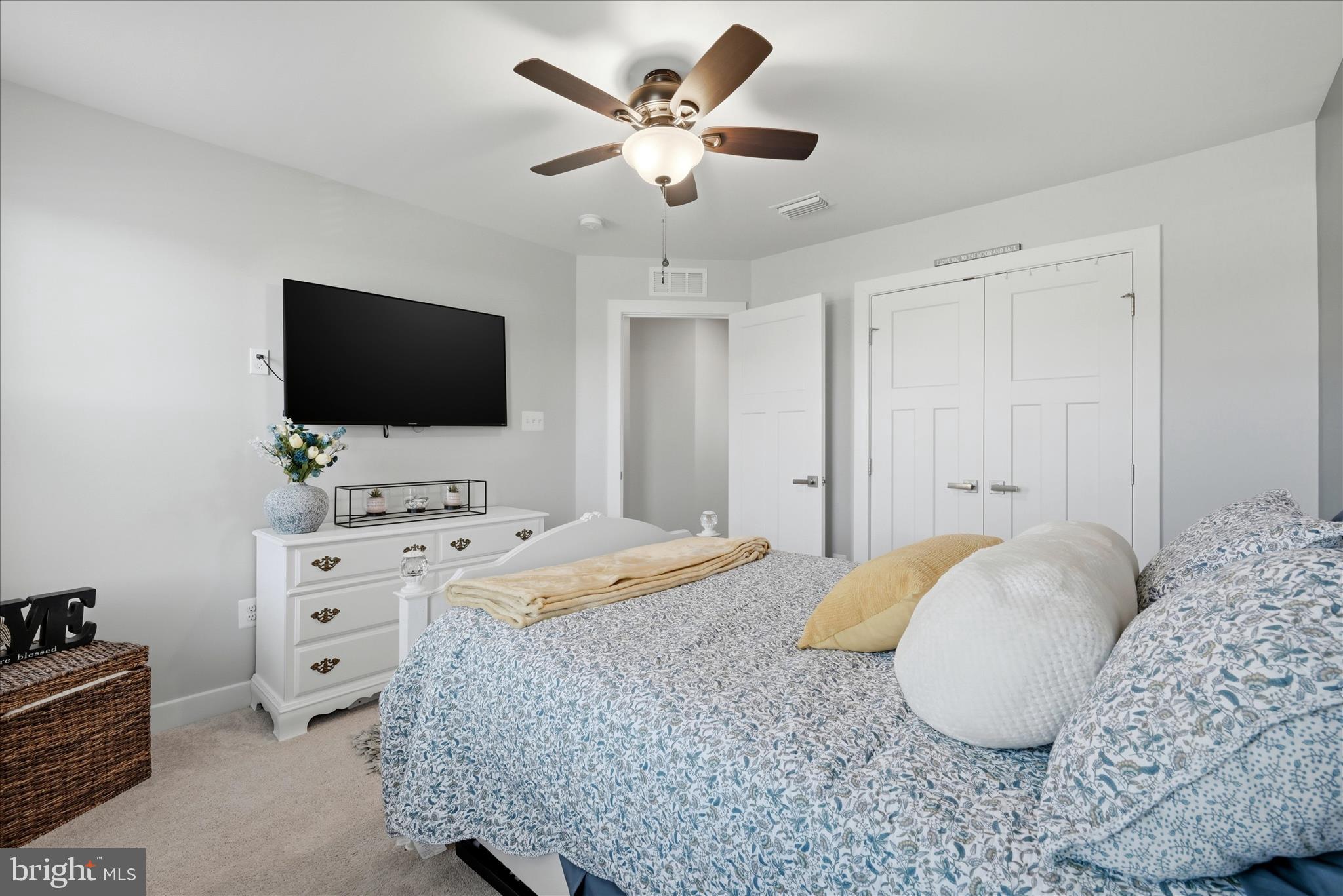 111 Decatur Circle Stephens City, VA 22655 - Photo 40 of 70 a bedroom with a bed and a flat screen tv