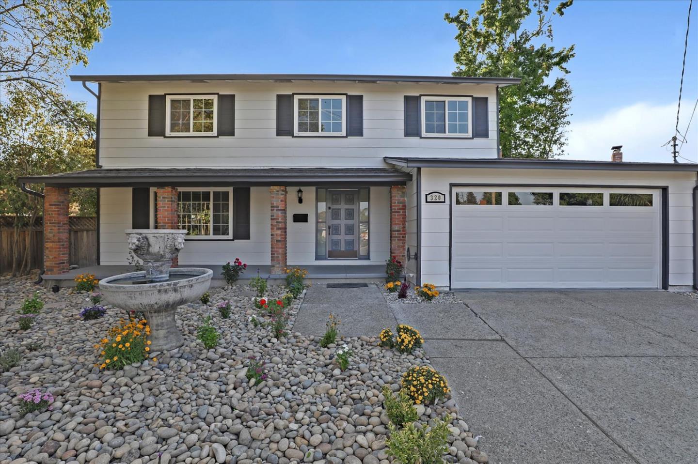 320 Ethan Court San Ramon, CA 94583 - Photo 1 of 46 a front view of a house with garden
