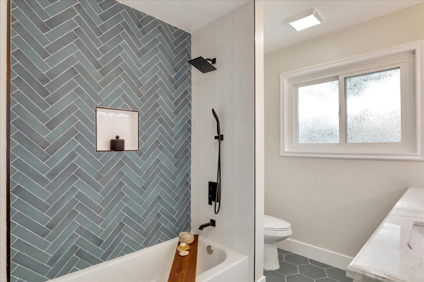 320 Ethan Court San Ramon, CA 94583 - Photo 32 of 46 a bathroom with a sink a toilet and shower