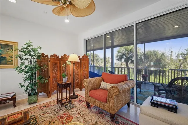 a living room with furniture and a table