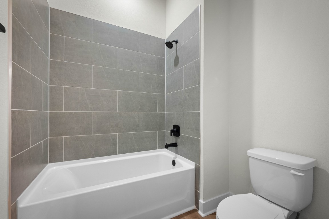 36199 Pitch Lane Hilliard, FL 32046 - Photo 11 of 40 a white bath tub sitting next to a toilet