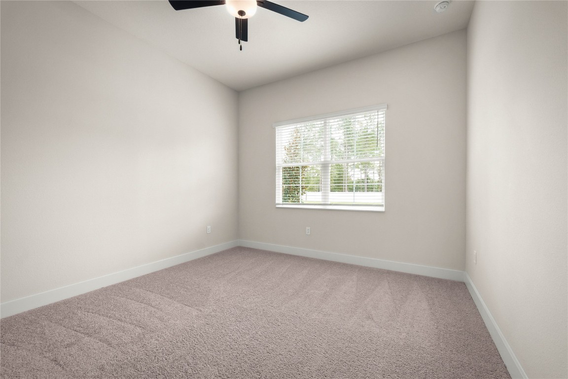 36199 Pitch Lane Hilliard, FL 32046 - Photo 15 of 40 an empty room with a window