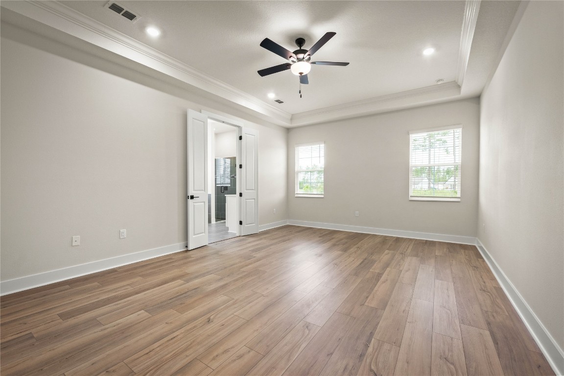 36199 Pitch Lane Hilliard, FL 32046 - Photo 28 of 40 an empty room with wooden floor and windows