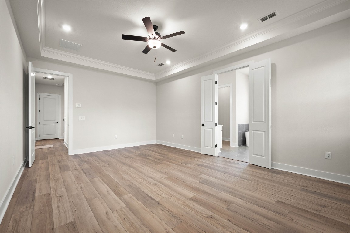 36199 Pitch Lane Hilliard, FL 32046 - Photo 30 of 40 an empty room with wooden floor and windows